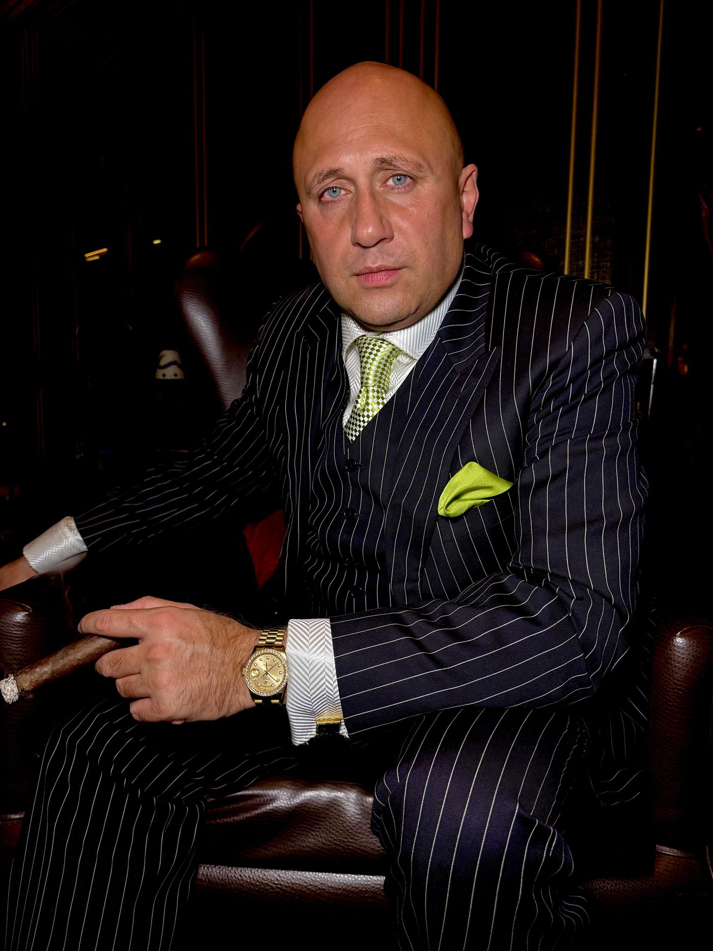Bobby Khan in a pinstripe suit